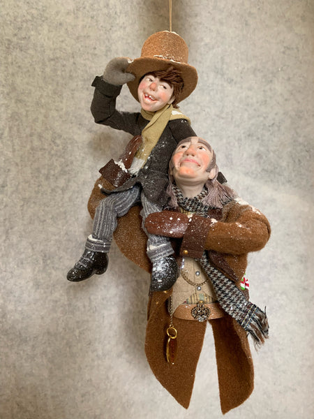 Scrooge is a new man carrying Tiny Tim on his shoulder-kenfolks