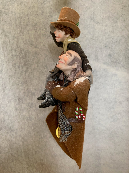 Scrooge is a new man carrying Tiny Tim on his shoulder-kenfolks