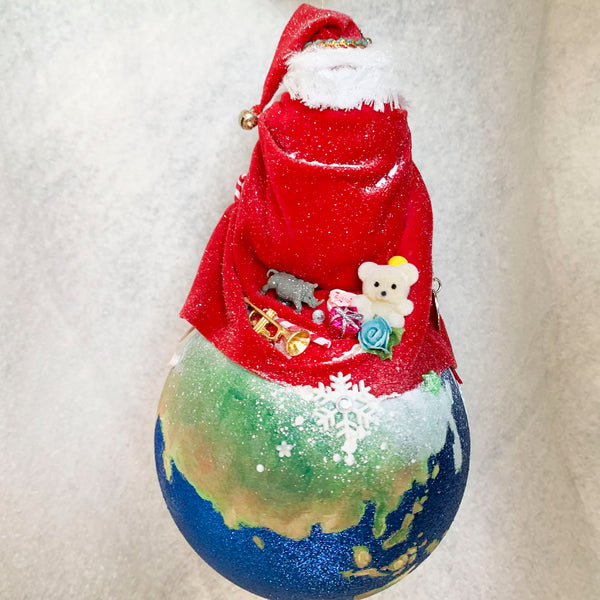 Santa on top of the world planning his Christmas adventure - Red& Green Striped outfit, red cape brimming with presents for children the world wide.-Hanging ornament-kenfolks